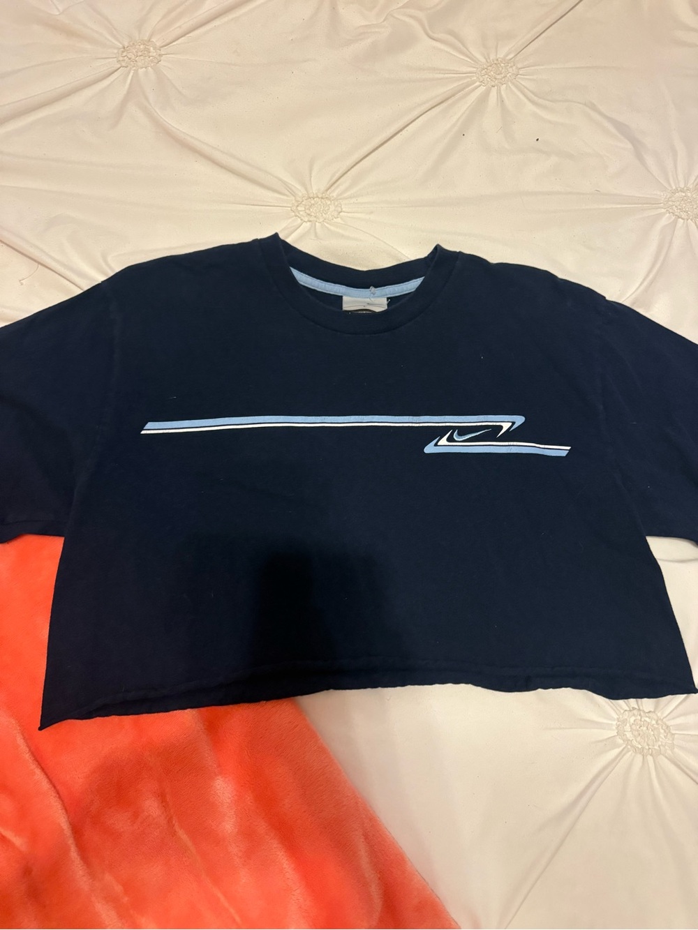 Nike Women's Navy Cropped Tee with Light Blue Stripe Graphic